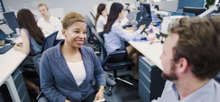 Woman getting to know her new coworkers on her first day