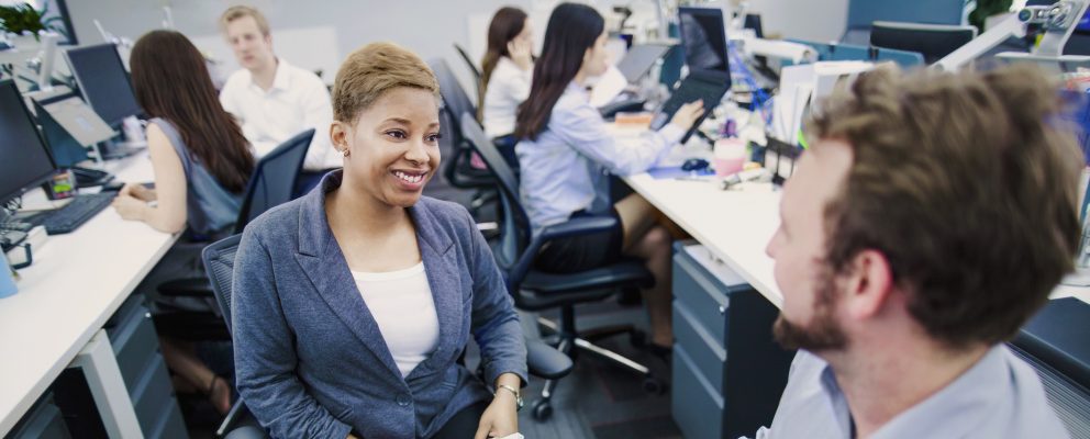 Woman getting to know her new coworkers on her first day