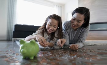 Mother and daughter counting change